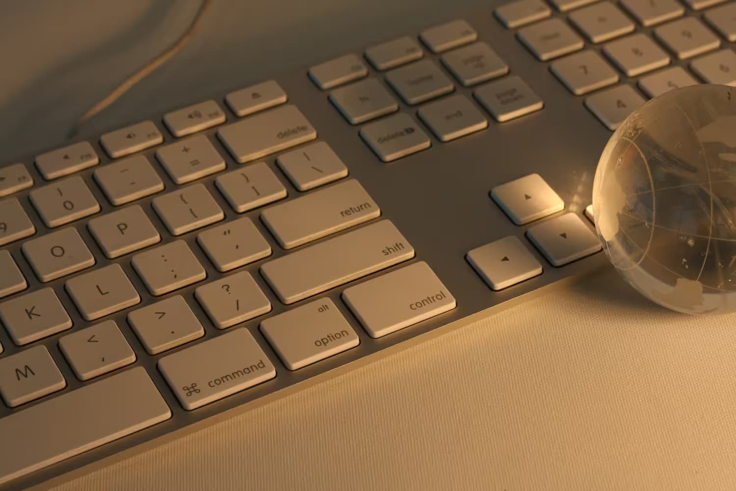 Keyboard with globe illustration representing global digital solutions